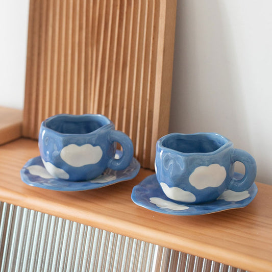 The Head in the Clouds Cup and Saucer Set
